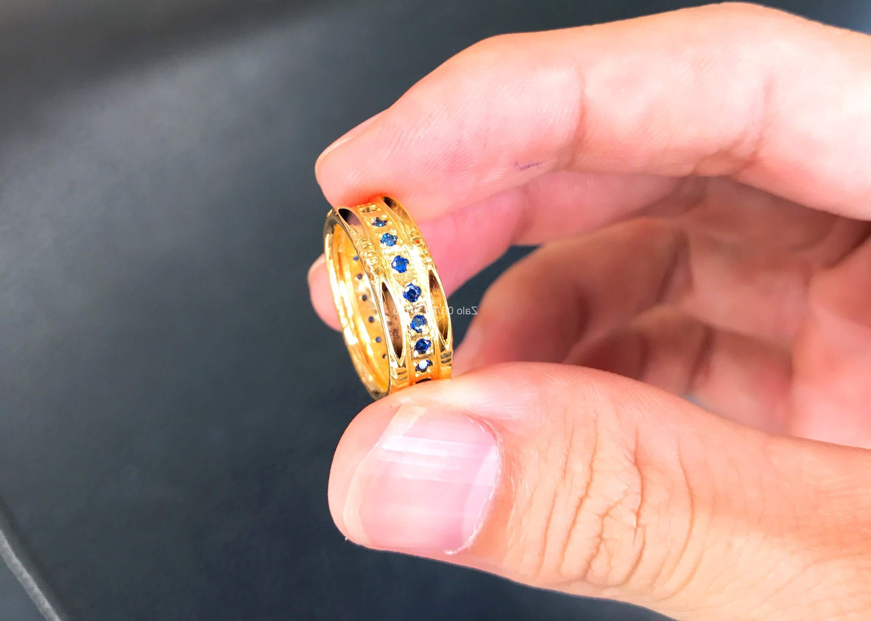 nhẫn lông voi nữ vàng 18k đính sapphire xanh